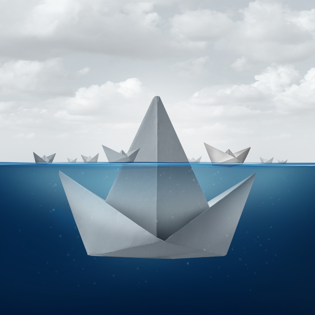 An image depicting paper boats, most of them on the lake, but the biggest of them mostly underwater, signifying the limits of personal knowledge and interpretation.