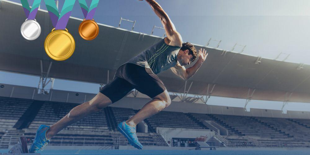 Imagen de un atleta corriendo en un estadio
