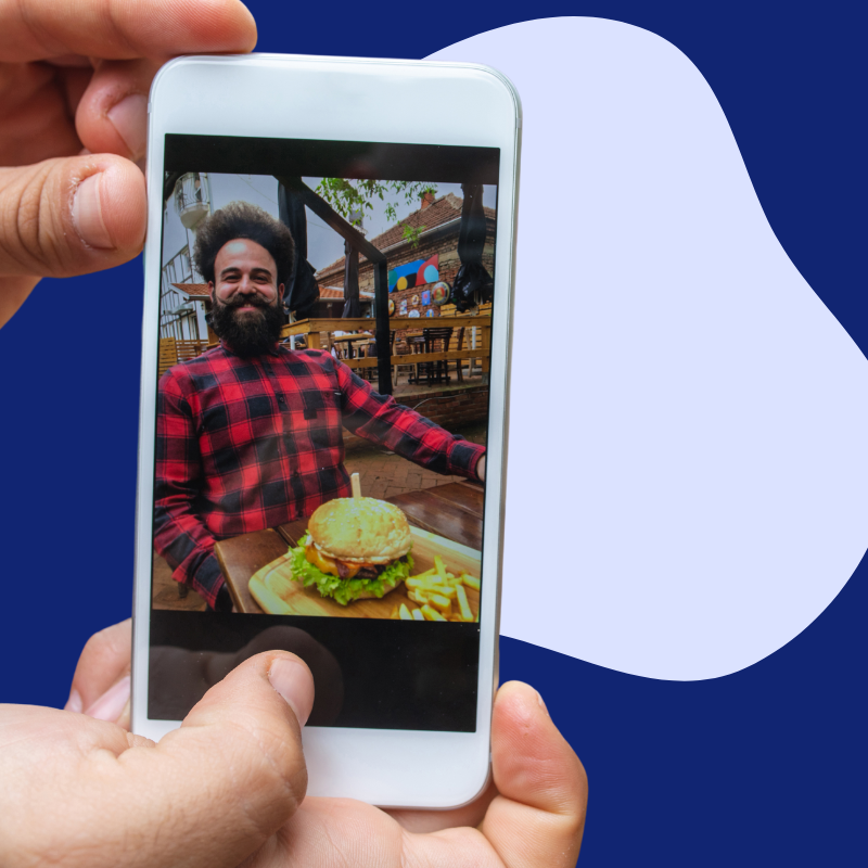 Closeup of a phone watching a food influencer video
