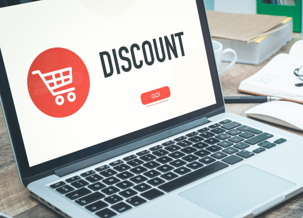 A laptop open to a screen that says "Discount"