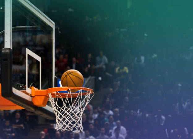 A basketball shot into the net