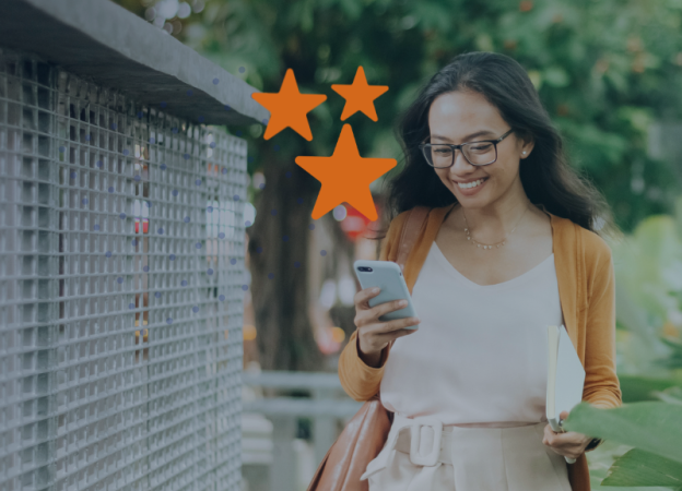 woman looking at her phone to check her ipsos isay rewards