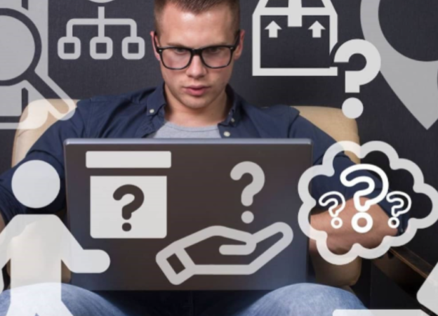 A man with laptop surrounded with various question icons 