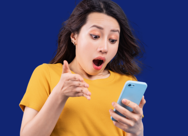 lady looking surprised at the phone